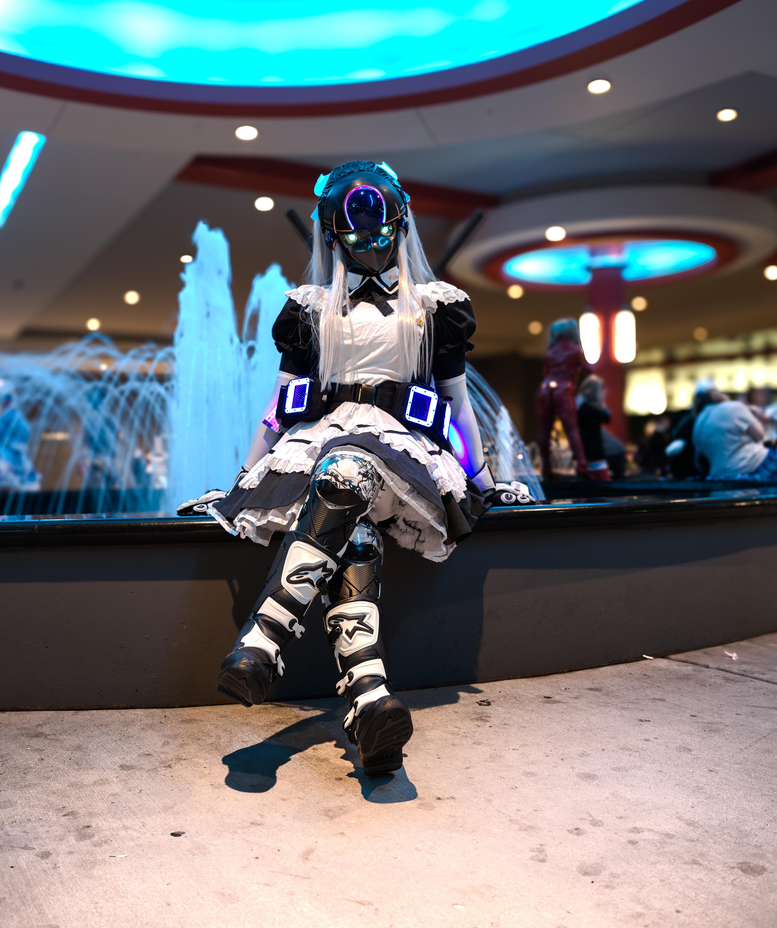 Sachi kigurumi sitting outside ACEN fountain